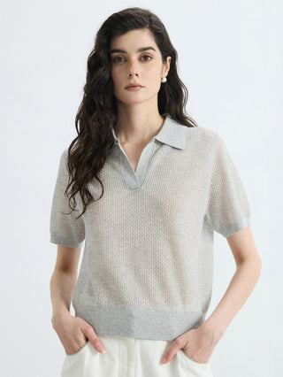 Light gray open-knit polo top with short sleeves, V placket, and pointed collar