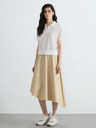White short-sleeve open-knit polo top worn with a midi skirt