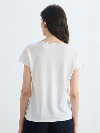 Back of white V-neck knit top with clean neckline and short sleeves