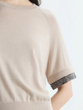 Beige wool-silk knit top with silver beaded cuff at short sleeve hem