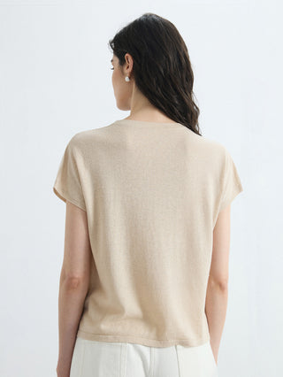 Back view of apricot crew-neck knit top with short sleeves