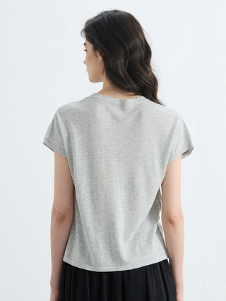 Back view of light gray crew-neck knit top with short sleeves