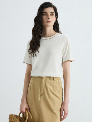 Ivory white contrast-trim T-shirt worn with khaki pants