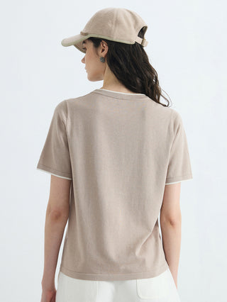 Back view of khaki knit T-shirt with contrast trim on neckline and sleeves