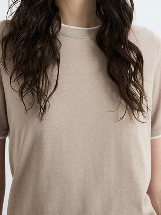 Khaki cotton-spun silk knit T-shirt close-up of contrast-trim neckline
