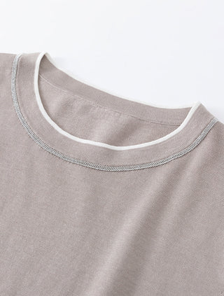 Khaki crew-neck knit T-shirt neckline detail with sparkly contrast trim