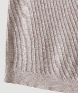 Light camel ribbed knit mock-neck top hem detail