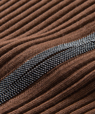Brown ribbed wool cardigan texture with zip detail