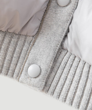 Ribbed knit hooded jacket panel with snap button and cord trim
