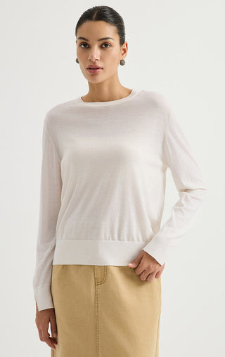 Women’s fine wool crewneck sweater in white, with cuff detail and long sleeves.