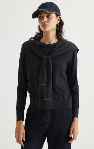 Women’s fine wool crewneck sweater in dark gray with draped front and cuff detail.