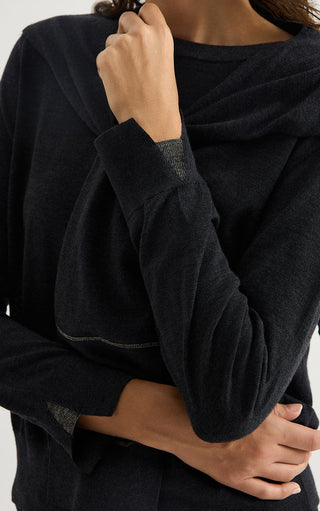 Women’s dark gray fine wool crewneck sweater sleeve with cuff detail and ribbed hem.