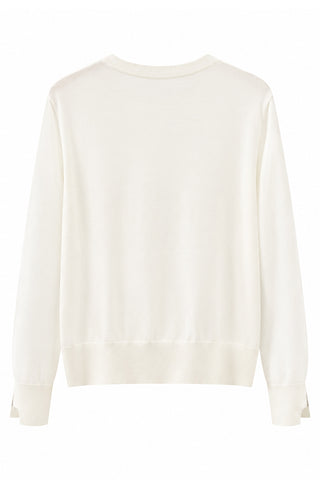 Fine wool crewneck sweater in white, back view with cuff detail and long sleeves.