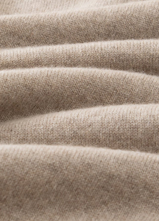 Camel cashmere knit fabric close-up with fine ribbed texture
