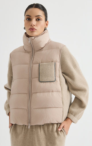 Camel quilted down puffer vest with stand collar, full-length zipper, and chest pocket.
