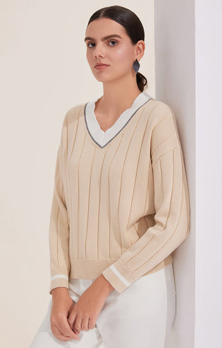 Apricot cotton V-neck sweater with white rib trim and fine vertical knit stripes