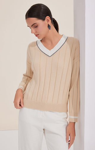 Apricot V-neck sweater with contrast collar, vertical knit stripes, and ribbed cuffs