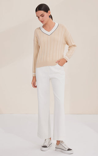 Apricot V-neck contrast trim sweater with long sleeves and ribbed cuffs