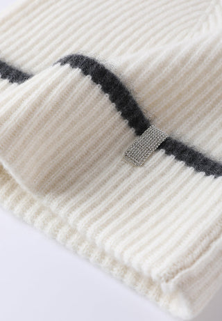 Cream ribbed cashmere cuff with black stripe and silver side tab.
