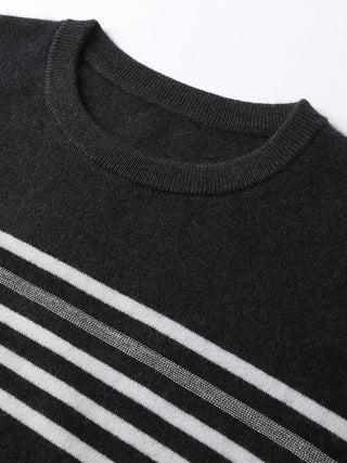 Dark grey cashmere knit sweater neckline with white and grey stripe band.