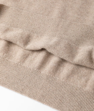 Camel cashmere knit hem detail with ribbed trim.