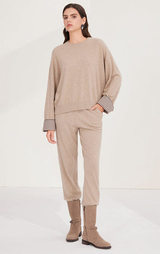 Camel relaxed knit sweater with matching drawstring-style pants and checked sleeve cuffs