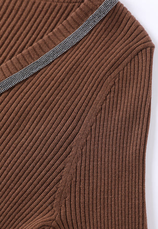 Brown ribbed wool sweater with beaded V-neck trim and side seam with slight gather.