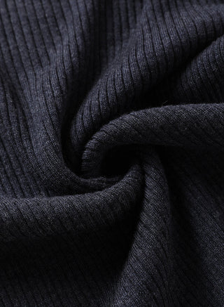 Blackish wool ribbed knit fabric close-up