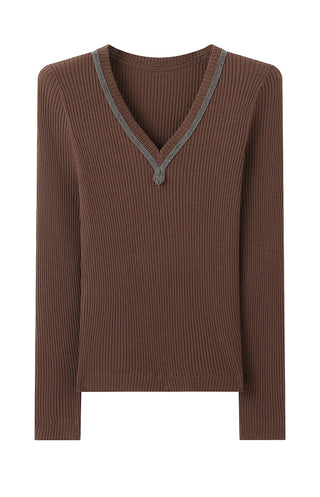 Ribbed brown wool V-neck sweater with gray trim and beaded pendant