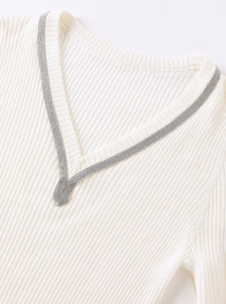 Ivory V-neck wool sweater with gray trim around neckline
