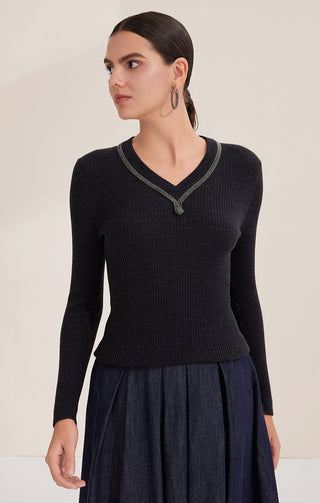 Black ribbed V-neck wool sweater with beaded trim and long sleeves