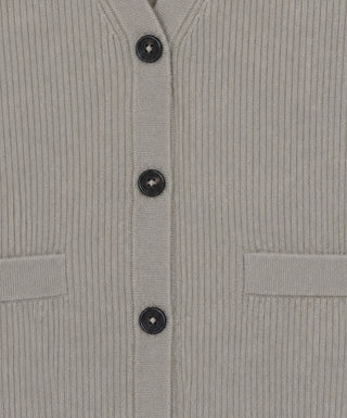 Cashmere knit vest button placket with three dark buttons