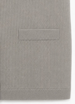 Cashmere knit vest hem with ribbed trim