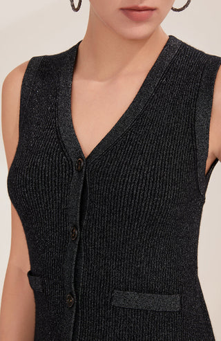 Black cashmere knit vest close-up of V-neck and dark buttons