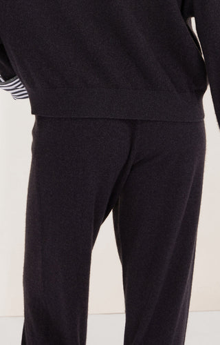 Black cashmere relaxed-fit pants with smooth fabric and relaxed straight leg