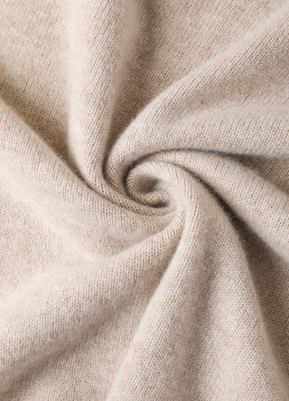 Camel wool knit fabric close-up with soft texture and fine ribbed weave