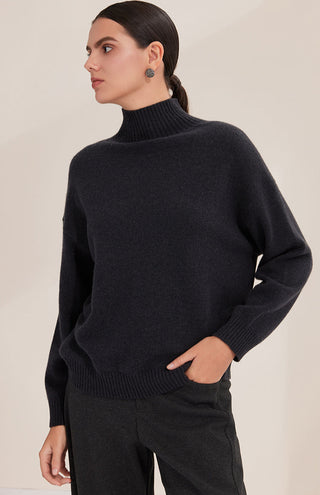 Black wool half-zip sweater in textured knit with ribbed cuffs and hem