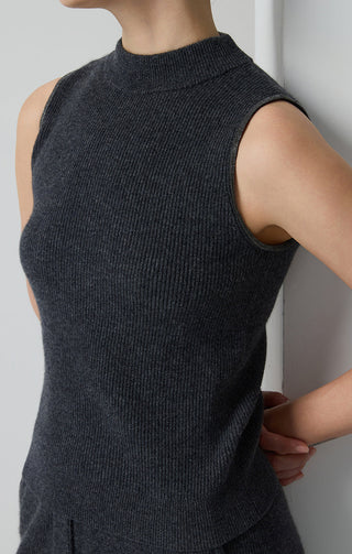 Graphite gray ribbed mock neck cashmere tank close-up of armhole metallic trim