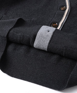 Dark grey wool cardigan sleeve with brown button and contrast cuff trim
