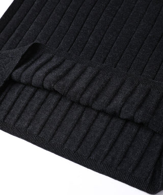 Black ribbed lightweight turtleneck sweater cuff with textured knit ridges.