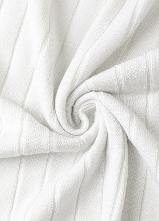 White ribbed knit turtleneck sweater fabric detail with curled texture.