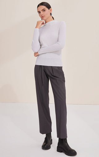 White lightweight wool ribbed turtleneck sweater, full front view, long sleeves.