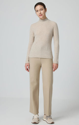 Camel cashmere sweater with high ribbed turtleneck and long sleeves