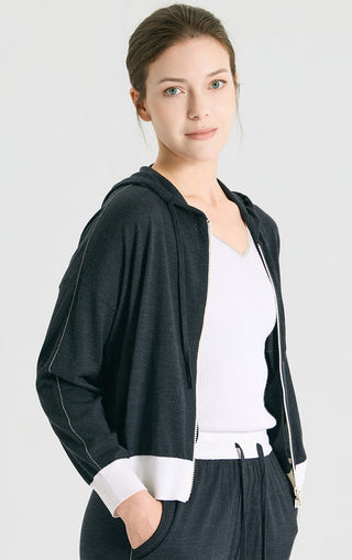 Graphite gray hooded knit cardigan with zipper front and white contrasting hem band