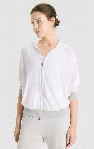 White wool-silk blend hooded knit cardigan with front zip and silver drawcord pulls