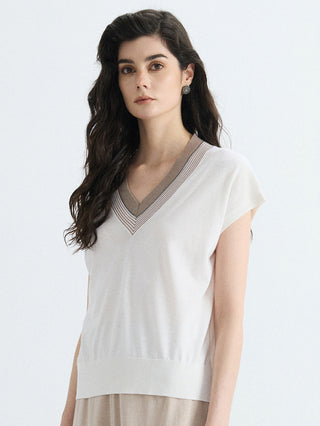 Ivory V-neck knit top with layered contrast trim around collar