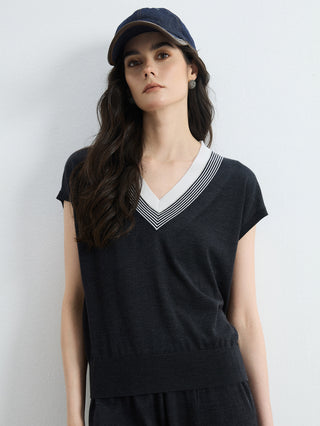Graphite gray knit top with V-neck and white/gray contrast striped trim