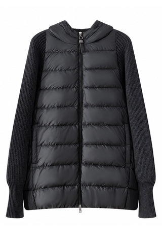 Dark hooded puffer vest with ribbed knit sleeves, front zip, and quilted baffles