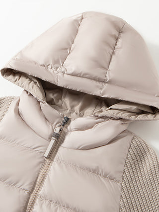 Camel hooded puffer vest with knit sleeves, zip front, and insulated hood