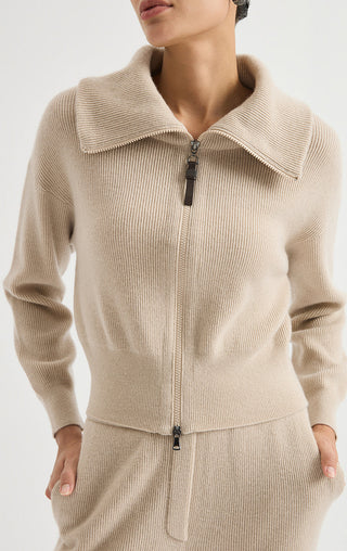 Camel ribbed zip cardigan close-up with stand collar and center front zipper.